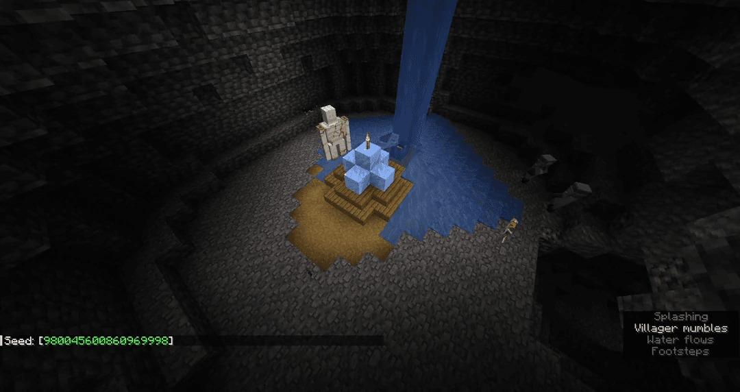 World's Smallest Village in Minecraft - A lonely village center and iron golem trapped in a tiny cave, dramatically lit from above